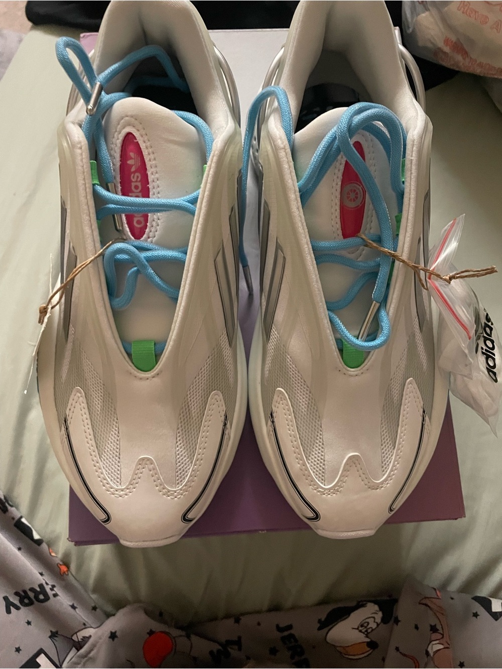 adidas White Sneakers with Light Blue Laces and Pink Tongue Accents